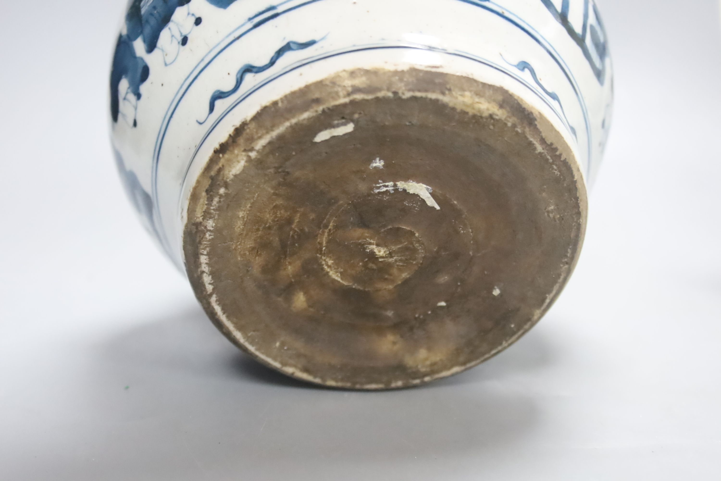 A Japanese Arita blue and white dish with scalloped edge, 29cm diameter and a modern Chinese jar